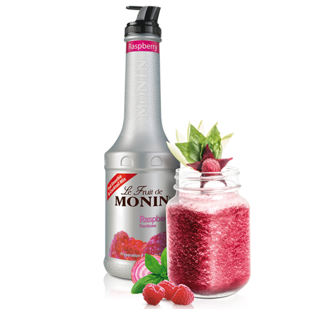 Monin Raspberry Puree Bottle 1 Ltr. Monin raspberry puree bottle with a glass of raspberry juice and garnishes on a white background - Discount Coffee