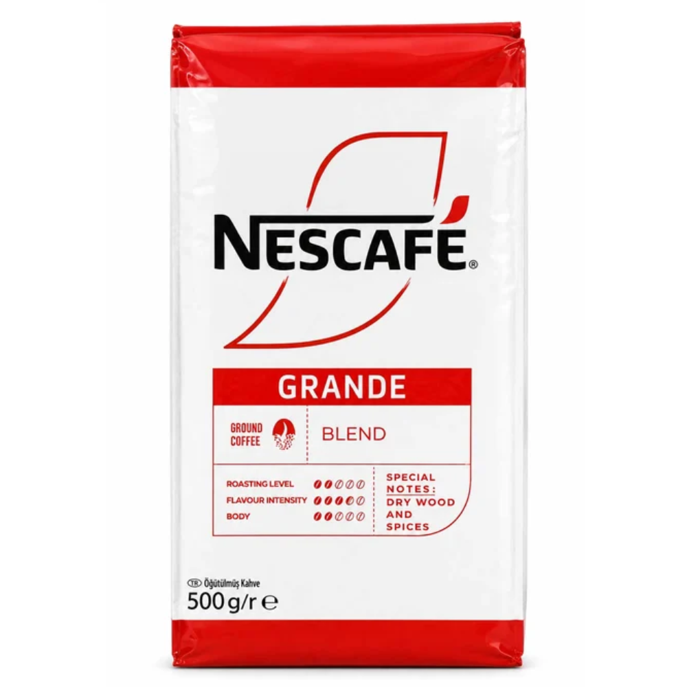 A 500g bag of Nescafe Grande Blend ground coffee, featuring a white bag with red borders and the black and red Nescafe logo.