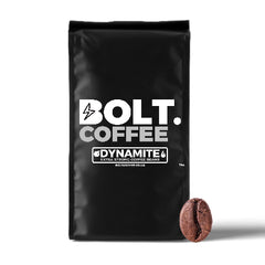 Bolt Dynamite Extra Strong Coffee Beans (1kg) Front of a Bag of Bolt Coffee and a Coffee Bean on a white background | Discount Coffee